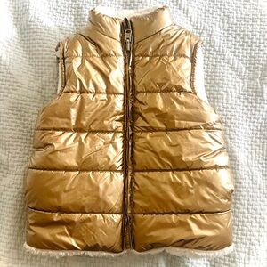 Epic Threads gold reversible fur vest.